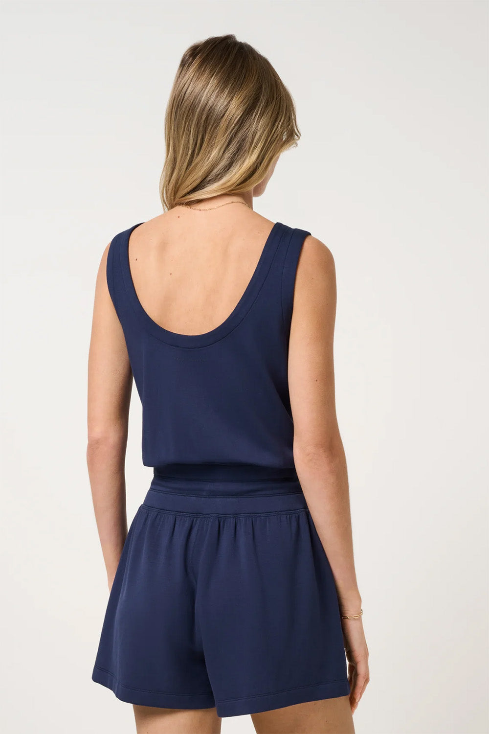 travis mathew skyloft soft romper navy blazer back