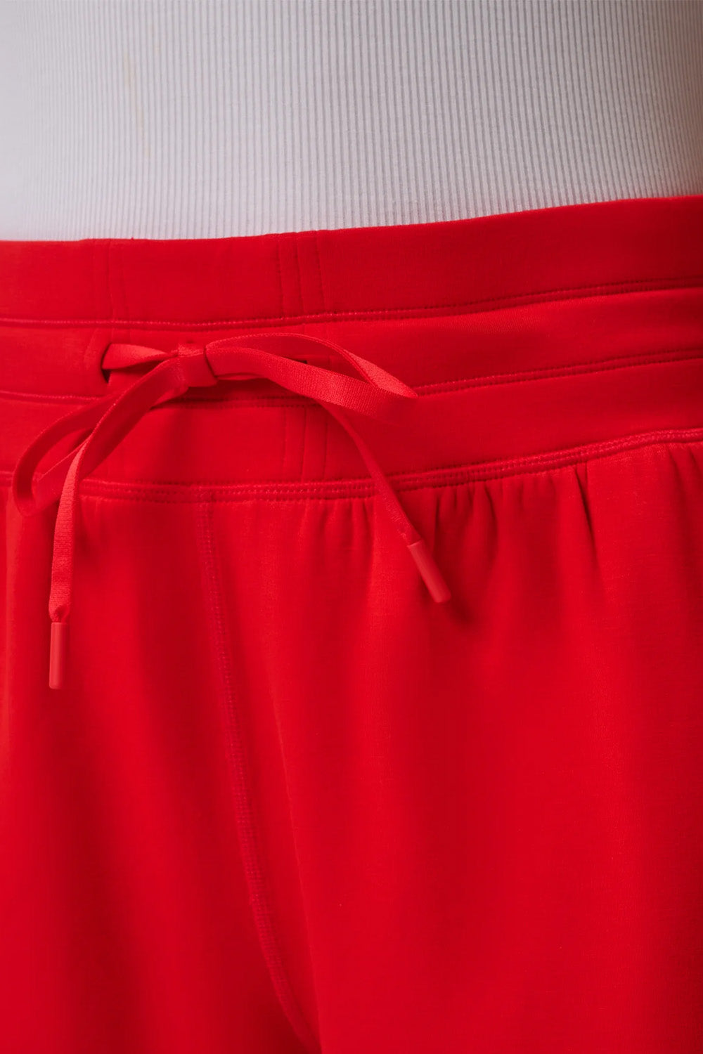 travis mathew skyloft soft tie short tomato detail