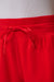 travis mathew skyloft soft tie short tomato detail