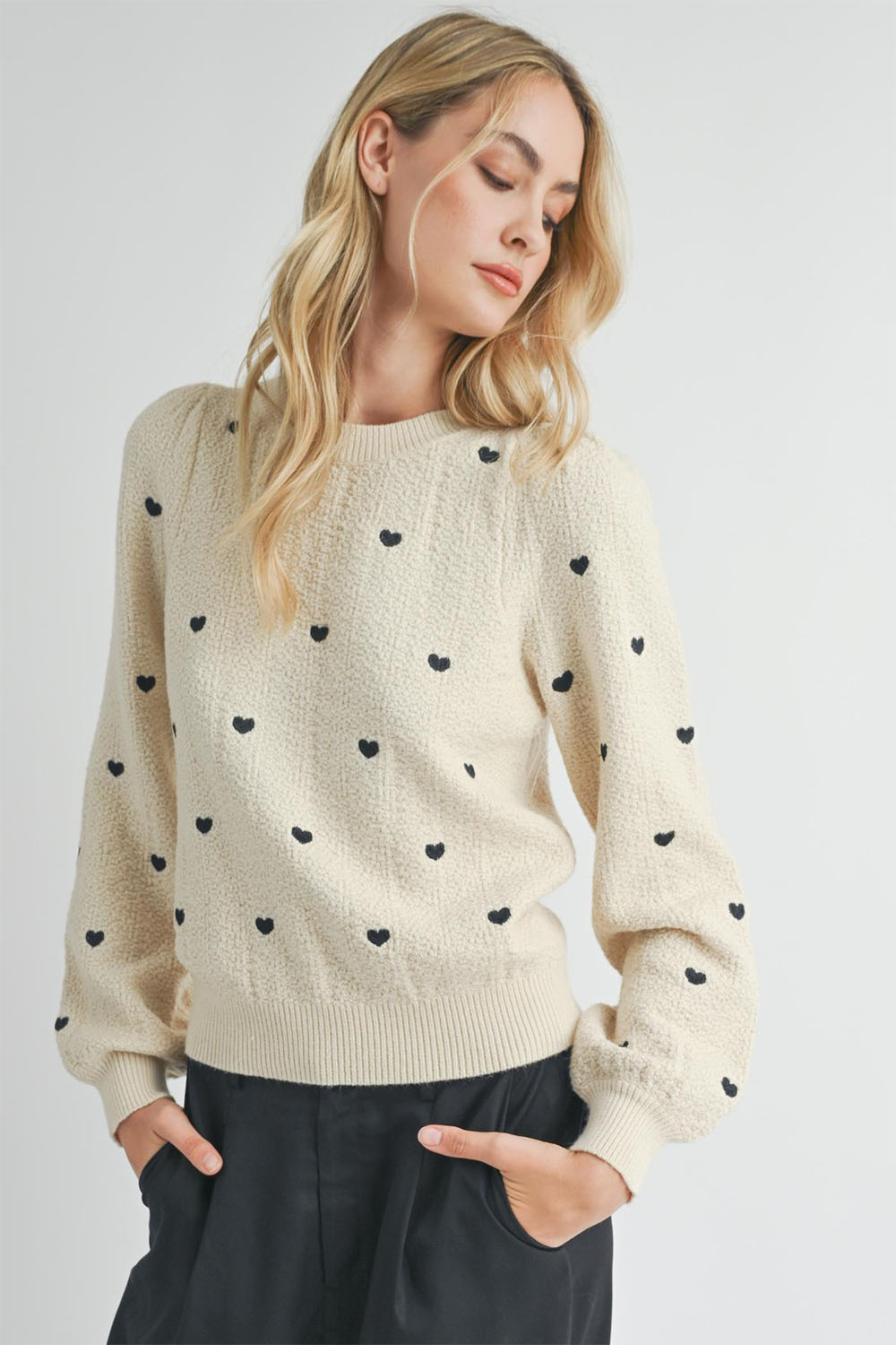 Sweater with heart and eyes discount