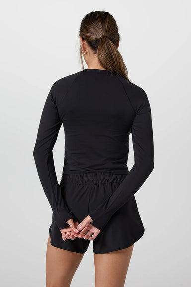 vuori-surge-seamless-long-sleeve-tee-black-back
