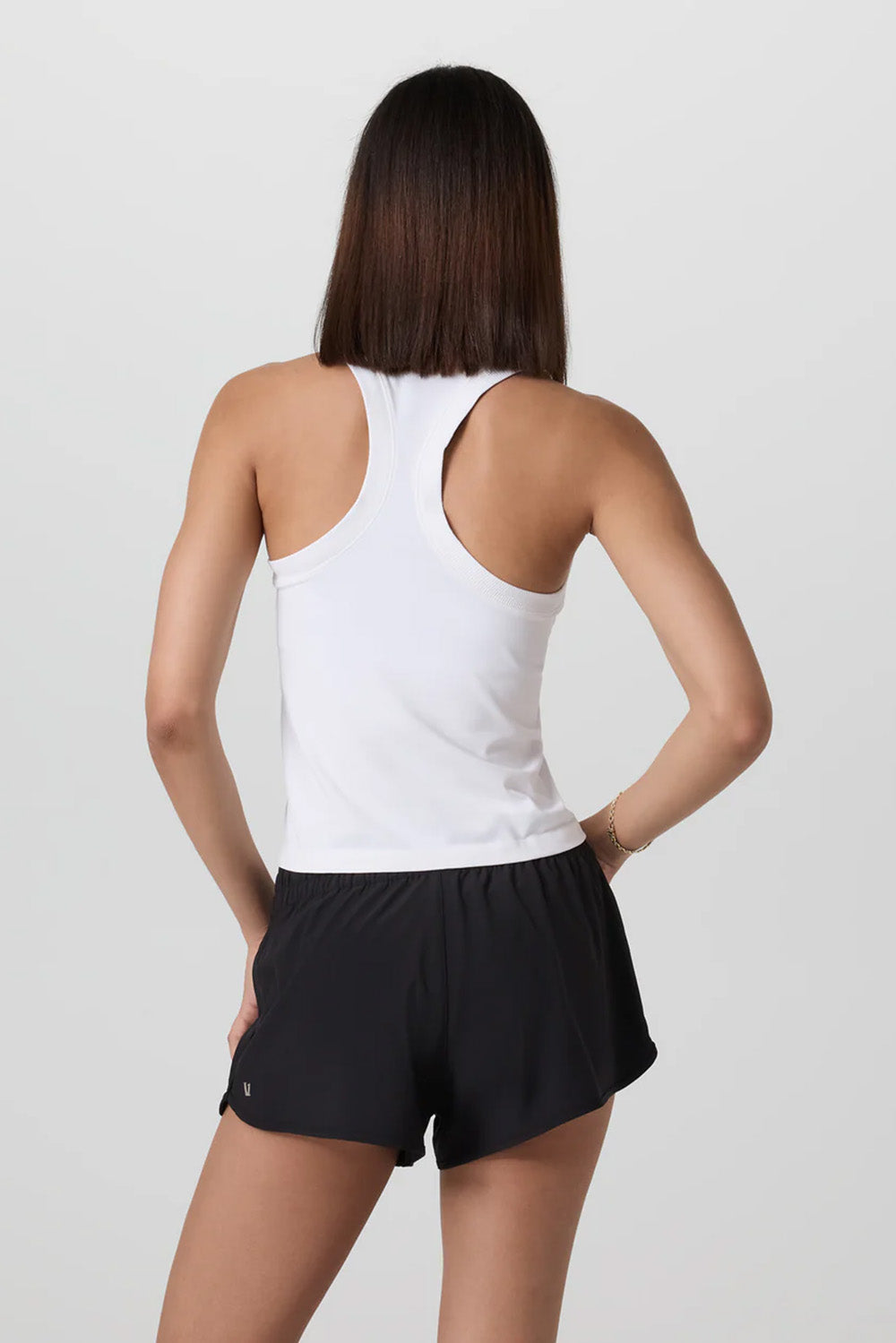 vuori-surge-seamless-tank-white-back