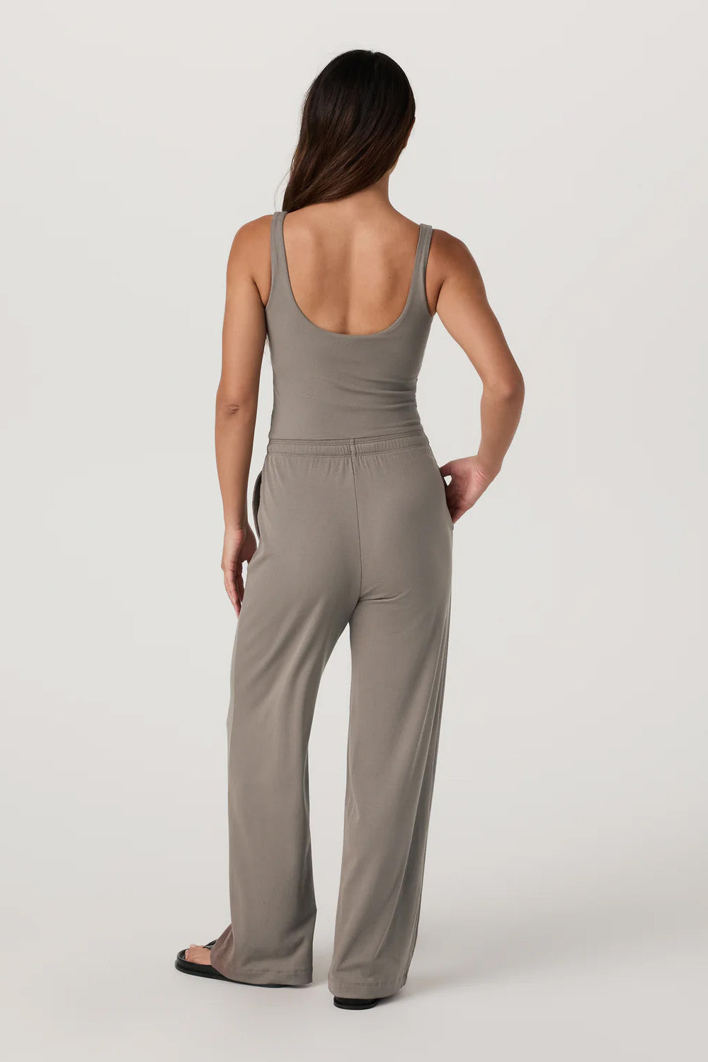 vuori pose scoop jumpsuit smokey taupe back