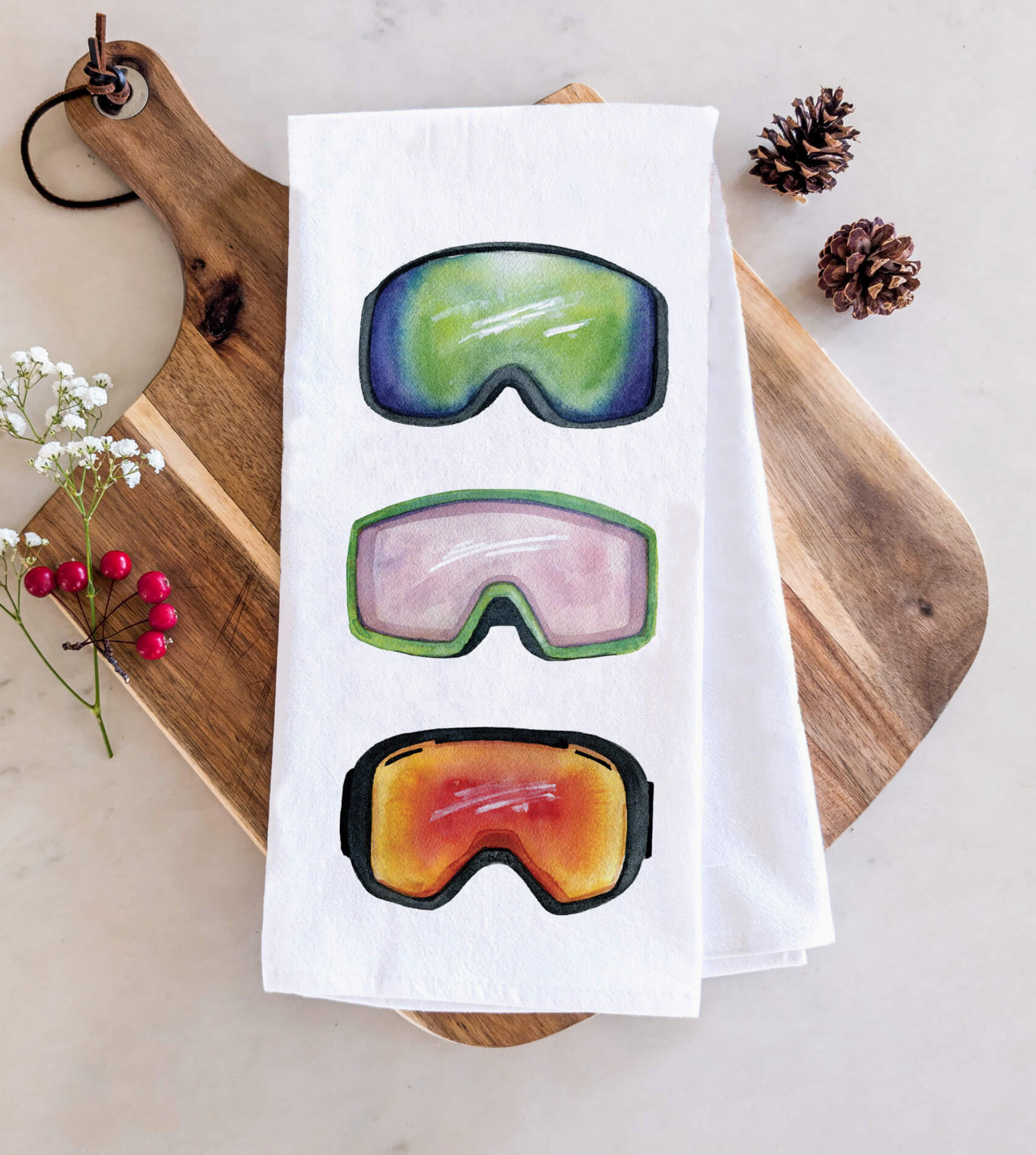 Watercolor Wednesday Ski Goggles Tea Towel — Styled view