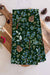 Watercolor Wednesday Winter Juniper Tea Towel — Styled view, second angle