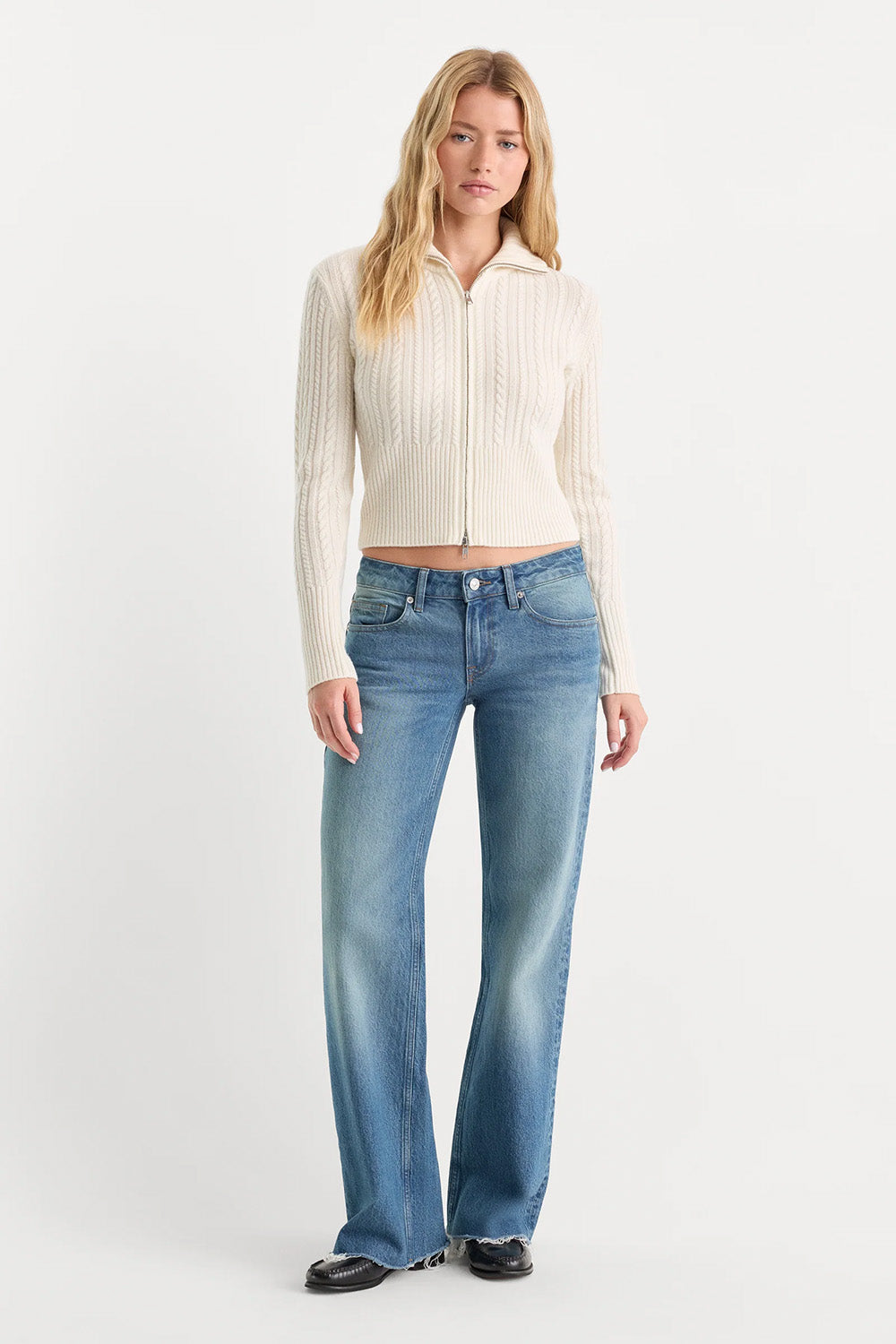 Good American The Cable Zip Up in Chalk — Styled view
